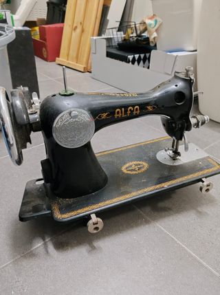Máquina de coser alfa