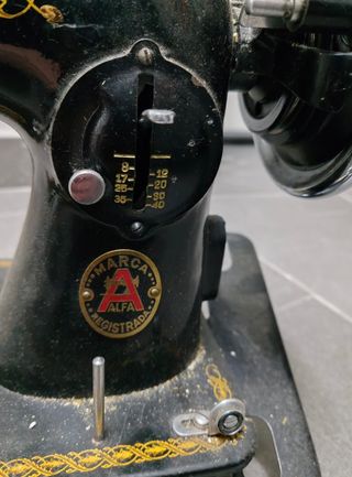 Máquina de coser alfa