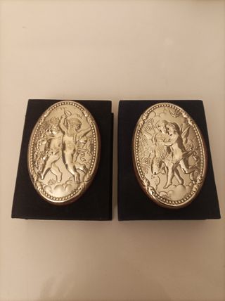 Placche in argento con angeli