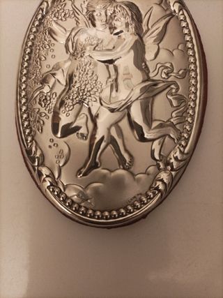 Placche in argento con angeli