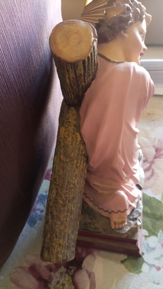 Niño Jesús con la cruz.
De Olot