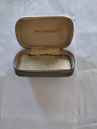 Estuches antiguos de máquinas de afeitar.