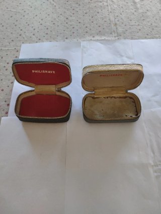 Estuches antiguos de máquinas de afeitar.
