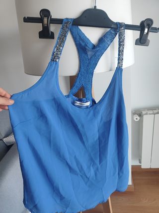 Blusa azul con lentejuelas