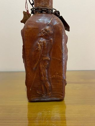Botella forrada piel imagenes y grabados D Quijote