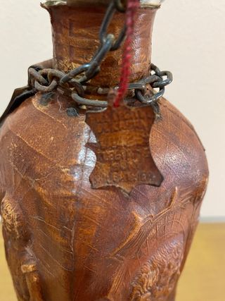 Botella forrada piel imagenes y grabados D Quijote