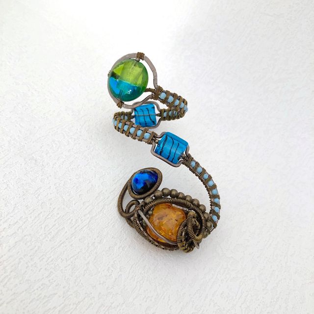 Copertura decorata per bottiglia