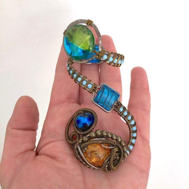 Copertura decorata per bottiglia