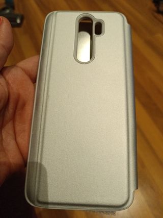 Funda con espejo nueva!