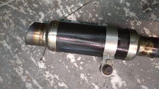Silencioso trasero Raceland Carbono.