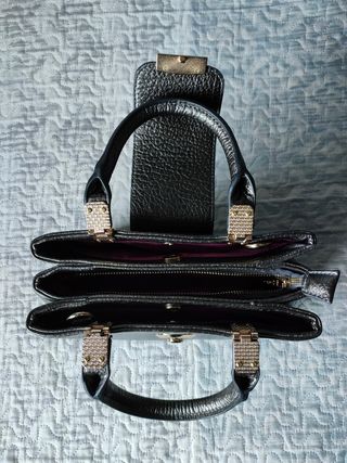 Elegante bolso de mano Noco