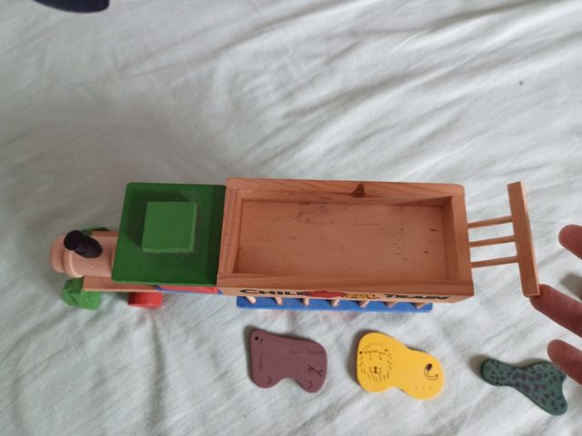 Tren, puzzle y jaula de madera