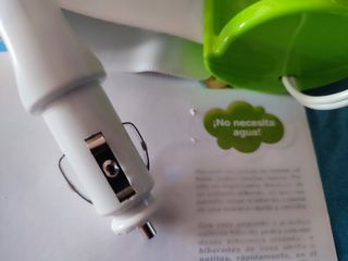 Calienta biberón/potito de coche marca Saro