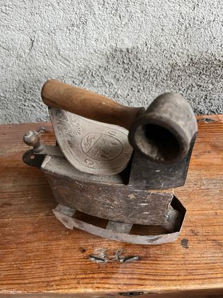 Plancha de carbon antigua