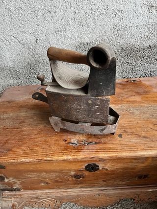 Plancha de carbon antigua