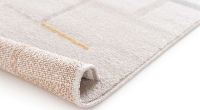 ALFOMBRA COLOR CREMA CON DISCRETO DISEÑO 