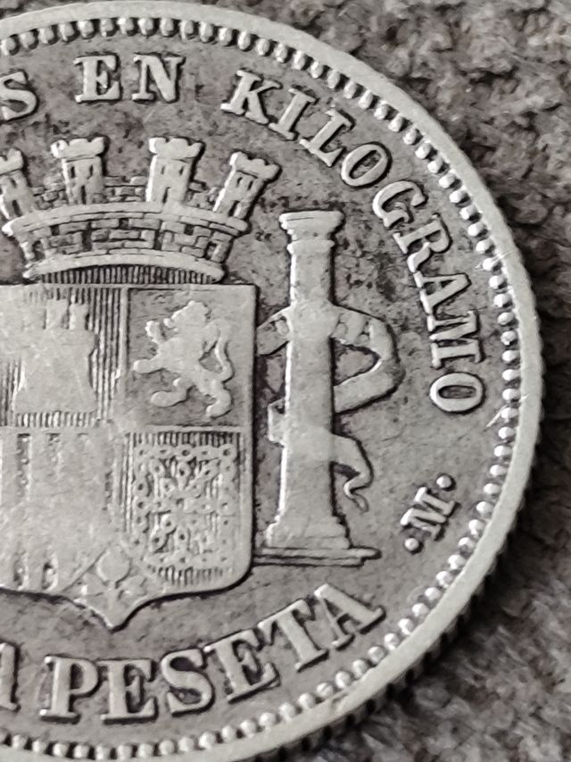 Moneda 1 peseta de 1869 ceca SNM MBC de plata Gobi