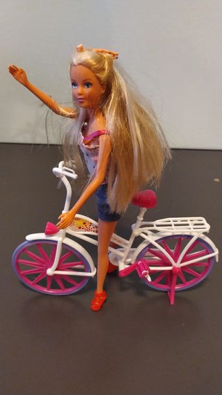 Bambola compatibile con bicicletta