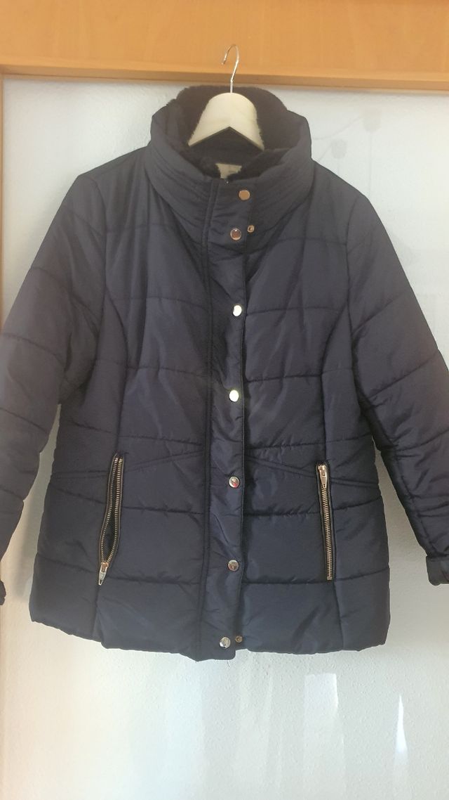 Chaqueta plumas. Elegante