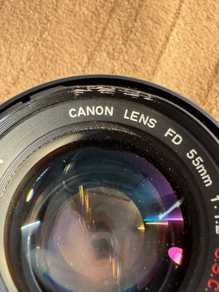 Canon A1 con objetivo maletin y flash