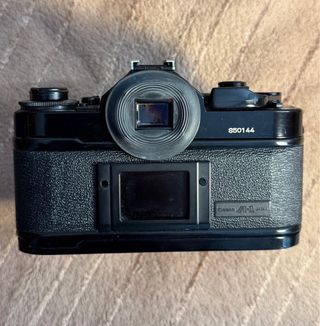 Canon A1 con objetivo maletin y flash