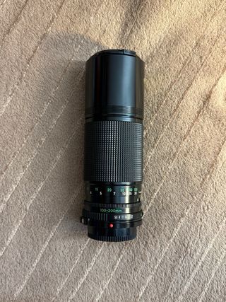 Canon A1 con objetivo maletin y flash