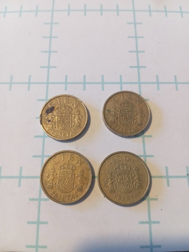 4 monedas de 100 pesetas