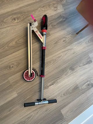 Patinete Decathlon Oxelo Play5 con suspensión rosa