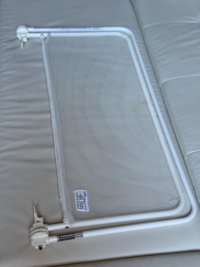 Barrera de cama abatible