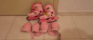 patines rosas talla 26-29 y protecciones