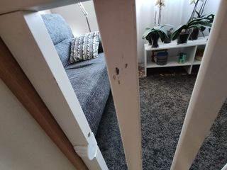 Cuna de madera blanca con estrellas