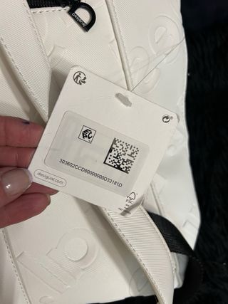 MOCHILA DESIGUAL NUEVA CON ETIQUETA