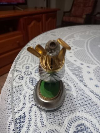 Mechero con palos de golf