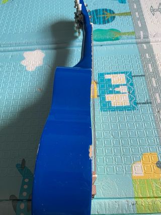 Guitarra de madera playmusic