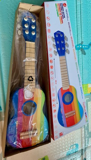 Guitarra de madera playmusic