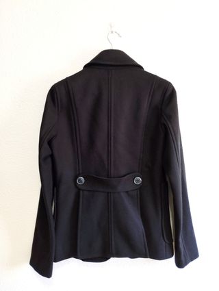 Abrigo de lana de Thomas Burberry.