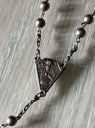 Rosario de plata niño