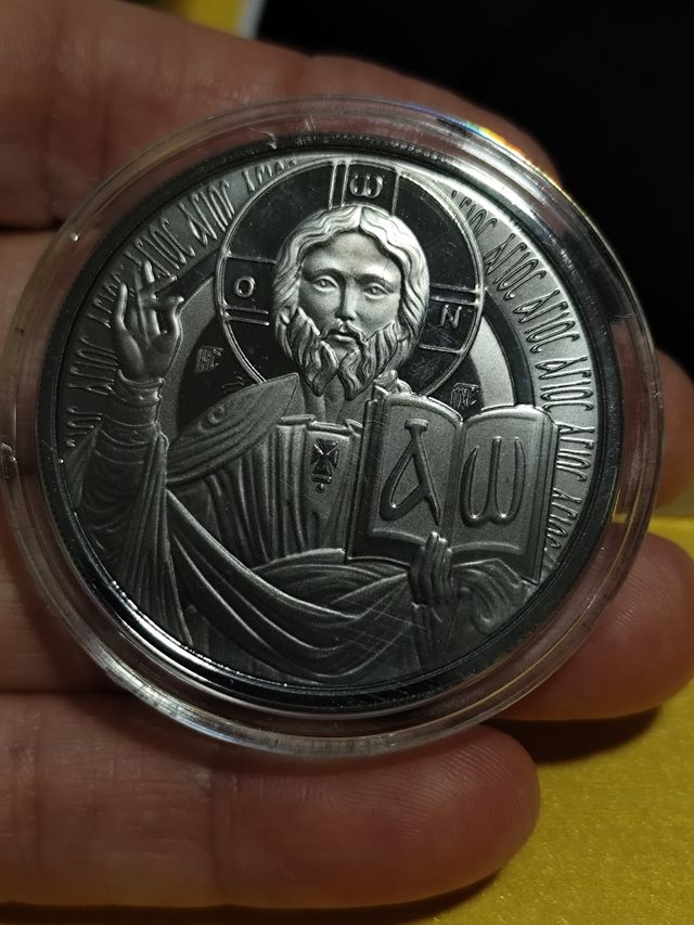 Preciosa moneda plata del Maestro Dios