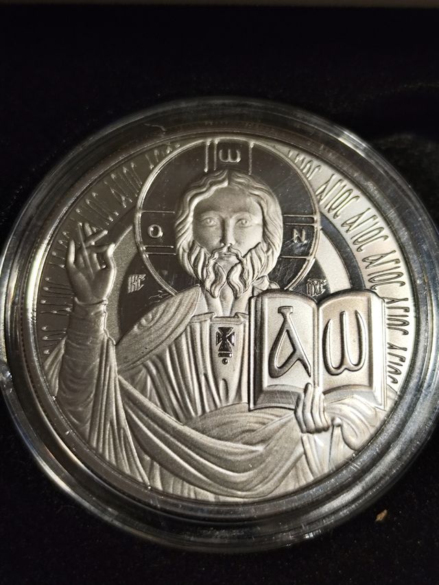 Preciosa moneda plata del Maestro Dios