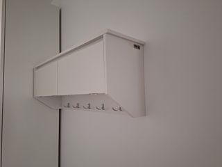 Colgador con almacenaje