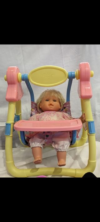 Muñeca con columpio