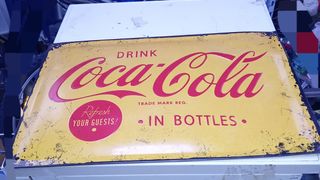 Carteles metálicos de publicidad antiguos