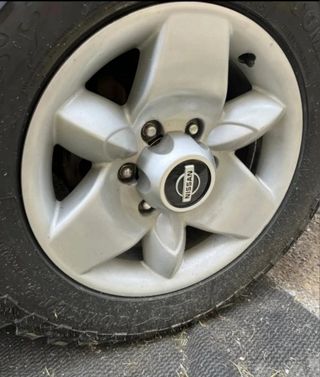 Tapacubos tapabujes Nissan Terrano