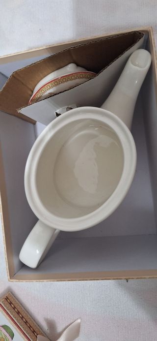 Teiera con decori festivi