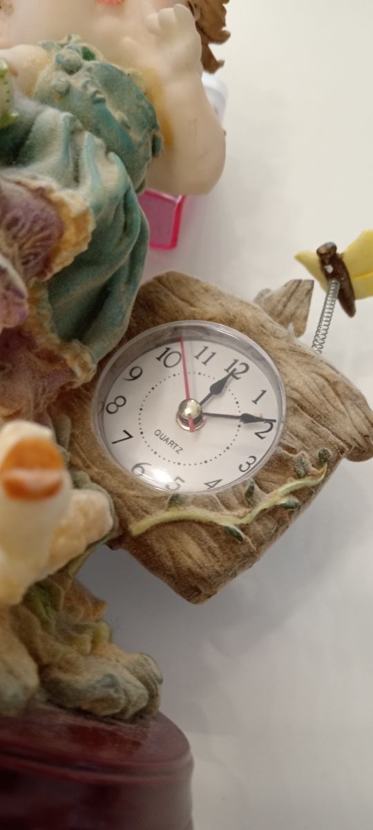 Statua con orologio funzionante