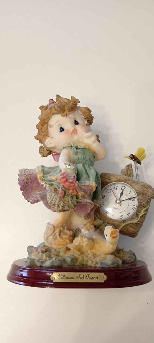 Statua con orologio funzionante