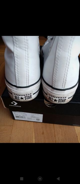 Converse plataforma piel.