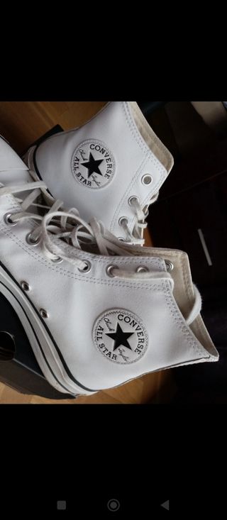 Converse plataforma piel.