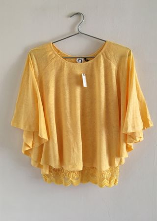Top capa amarillo de Anthropologie talla XS