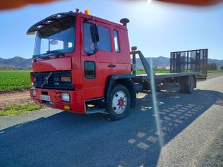 CAMION VOLVO FL6 CON PLATAFORMA